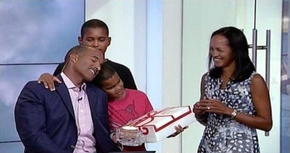 Paul Goodloe with his wife and family.